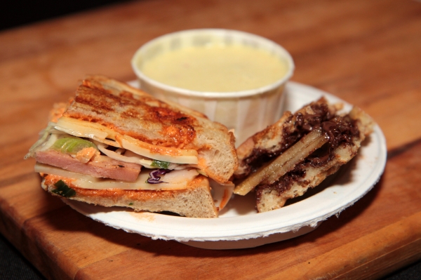 Leslieville Cheese Market prepared The Hawaiian Steak, Saffron Fennel Cream Soup and Wafella. The Hawaiian Steak: Rye bread, spam, Swiss cheese, coleslaw, green onions, Hungarian smoked paprika spread. Wafella: Gluten-free waffles, coconut gouda, and Nutella® Photo taken by Pandora Angelique Lee 